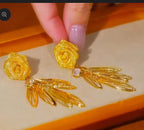 14 k rose earring